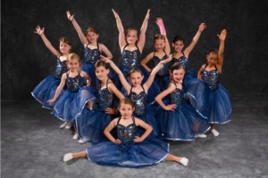 dancers in blue costumes